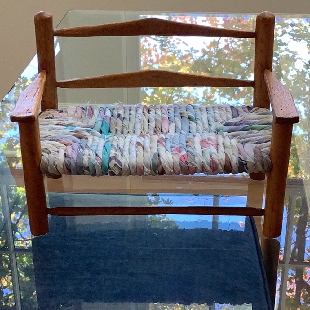 Vintage dolls wood bench with cloth seat. Approximately 9 1/2 “.  Good condition